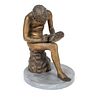 A Continental Patinated Bronze Figure: Spinario
Height 10 1/2 x diameter of base 7 1/2 inches.