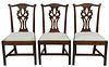 Chippendale Mahogany Side Chairs, set of three with pierced carved splat over slip seats on molded edge front legs and H-stretchers, (one chip to corn