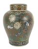 Chinese Cloisonne Porcelain Jar, with cover, having enameled wild flowers, birds and butterflies, 19th Century, height 9 1/2 inches, William Doyle Gal