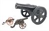 Three Iron Civil War Cannons, mid 19th century, two small toy sized along with a larger model for 1 inch balls, length 15 inches, width 11 inches.
