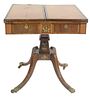 Regency Rosewood Library Table with ormolu mounts, top opens from either end, leather top having two opposite side drawers in frieze, on square shaft 