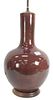 Chinese Maroon Flambe Glazed Porcelain Vase in globular form with tall neck, height of vase 19 inches.