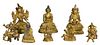 Eight miniature bronze gilt Buddhas, heights 1 1/4 inches to 2 3/4 inches.