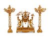 A Louis XV Style Gilt Bronze, Porcelain and Cut Glass Clock Garniture
Height of clock 24 x width 27 1/2 x depth 8 inches; height of candelabra 41 x wi