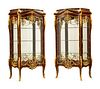 A Pair of Louis XV Style Gilt Bronze Mounted Vitrine Cabinets
Height 71 x width 43 x depth 20 inches.