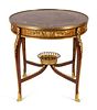 A Louis XV Style Gilt Bronze Mounted Marquetry Table
Height 30 x width 29 1/2 inches.
