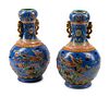 A Pair of Chinese Pierce Carved and Enameled Porcelain Two-Part Vases
Height 17 1/2 inches.