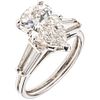 RING WITH DIAMONDS IN PLATINUM 1 pear cut diamond ~2.40 ct Clarity: VS2 and 4 baguette cut diamonds ~0.80 ct. Size: 6
