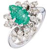 RING WITH EMERALD AND DIAMONDS IN 10K WHITE GOLD 1 pear cut emerald ~1.0 ct and 24 brilliant cut diamonds. Size: 7