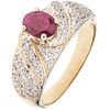 RING WITH RUBY AND DIAMONDS IN 14K YELLOW GOLD 1 oval cut ruby ~0.80 ct and 47 brilliant cut diamonds ~0.32 ct. Size: 7 ¾