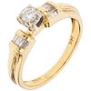 RING WITH DIAMONDS IN 14K YELLOW GOLD with 9 brilliant and trapezoid baguette cut diamonds ~0.24 ct. Weight: 3.3 g. Size: 6 ½