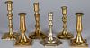 Five brass candlesticks, and a Paktong stick
