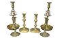Three Pairs of Brass Candlesticks to include, two Queen Anne petal base, height 7 1/2 inches, pair of shaped base, height 8 inches, along with pair wi