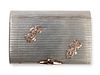 A Russian Silver, Gold and Charm Applied Cigarette Case