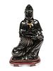 A Chinese Export Carved Jade Figure of Guanyin