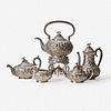 A "Baltimore Rose" five-piece sterling silver repouss&#233; tea and coffee service Baltimore Sterling Silver Co., Baltimore, MD, circa 1900