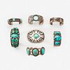 A group of Navajo silver and turquoise bracelet/cuffs and a belt buckle 20th century
