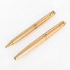 A Pair of Limited Edition Caran d'Ache Gold Plated Pens