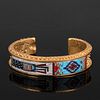 A Carl and Irene Clark Gold Cuff Bracelet with Micro-Mosaic Inlay