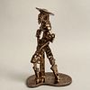 Don Quijote. Siglo XX. Elaborado en cerámica esmaltada tipo Nischli. Acabado metálico. Con base. 37.5 cm altura