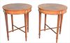 Pair of Baker Round Mahogany Inlaid Tables having X stretcher base, height 27 1/2 inches, diameter 23 1/2 inches.