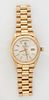 Man's 18K Yellow Gold Rolex Oyster Perpetual Day Date "Presidential" Wristwatch, with an Italian 18K yellow gold link band, running. Provenance: The E