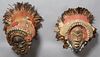 Pair of Kuba African Masks, early 20th c., with cowrie shell and feather decoration, H.- 15 in., W.- 18 in., D.- 10 in. Provenance: Property from Gent