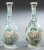 Pair of Chinese Hexagonal Porcelain Polychromed Baluster Vases, early 20th c., with long necks, decorated with incised flowers, cranes, and birds, H.-