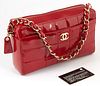 Chanel Red Chocobar Patent Leather Logo Zip Shoulder Bag, c.2002-2003, the chain interlaced with red patent leather, with a front pocket and golden br