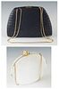 Two Vintage Judith Leiber Handbags, c. 1980, one in a navy blue leather with navy blue stitch decoration, the gold clasp opening to a navy blue linker