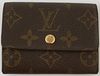 Louis Vuitton Brown Monogram Mini Coin Purse, the coated canvas with a brass snap accent, opening to two coin compartments and one folded bill compart