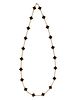 VAN CLEEF & ARPELS, YELLOW GOLD AND ONYX 'ALHAMBRA' NECKLACE