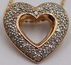 JEWELRY. 14kt Gold and Diamond Heart Necklace.