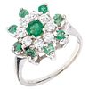 RING WITH EMERALDS AND DIAMONDS IN 14K WHITE GOLD 9 Round cut emeralds ~0.60 ct and 8 Brilliant cut diamonds~0.56 ct