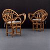 Pair of McGuire Rattan Arm Chairs, Paige Rense Noland Estate
