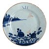 A CHINESE BLUE AND WHITE LANDSCAPE DISH