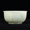 A WHITE JADE LOBED FORM FLORAL BOWL