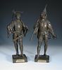 After Emile Picault, a pair of bronze standing figures of an archer and standard bearer, titled in F