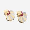 A pair of Retro eighteen karat bicolor gold and ruby ear clips