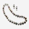 A South Sea Tahitian cultured pearl, diamond, and eighteen karat white gold necklace with similar earclips