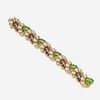 A diamond, sapphire, emerald, and eighteen karat gold bracelet, Tiffany & Co.
