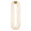 A Triple Strand of Pearls with 14K Diamond Clasp