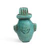An Egyptian Faience Heart Amulet
Height 7/8 inches. 