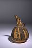 A Cypriot Terracotta Jug
Height 6 1/2 inches. 