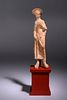 A Greek Terracotta Woman Wearing a Polos (broad-rimmed hat)
Height 8 1/2 inches. 