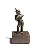 A Hellenistic Bronze Harpocrates  
Height 3 1/4 inches.  