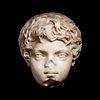 A Roman Marble Portrait Head of the Young Caracalla
Height 9 1/4 inches. 