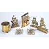 A Group of Brass Door Stops and Other Articles