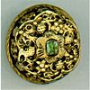 A 17TH CENTURY SMUGGLERS TYPE EMERALD CENTERED BUTTON