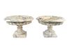 A Pair of Italian Variagated Marble Campana-form Urns
Height 9 x diameter 14 inches.